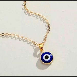Blue evil eye pendant necklace